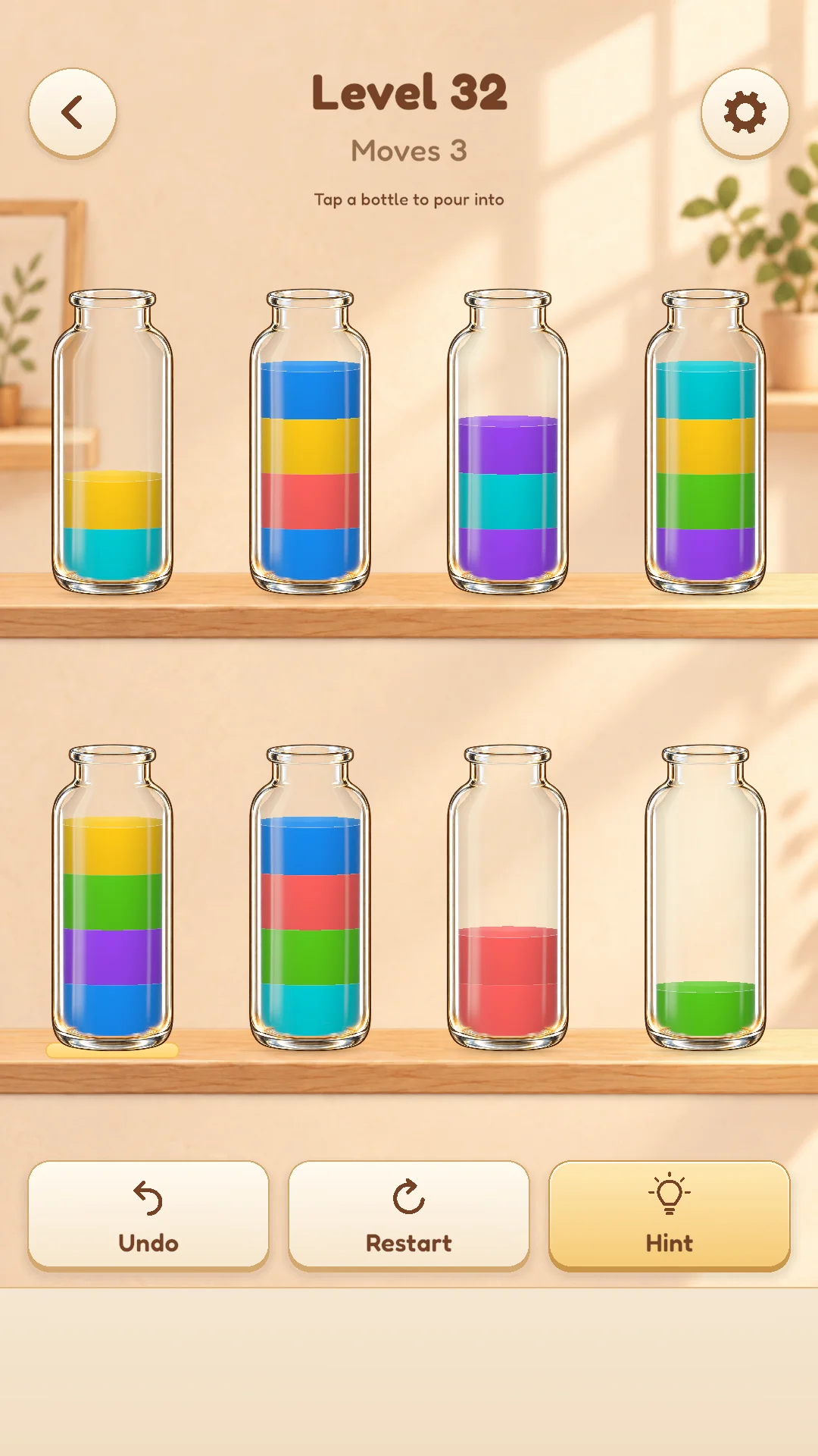 Level 32 puzzle board with mixed colors in glass bottles